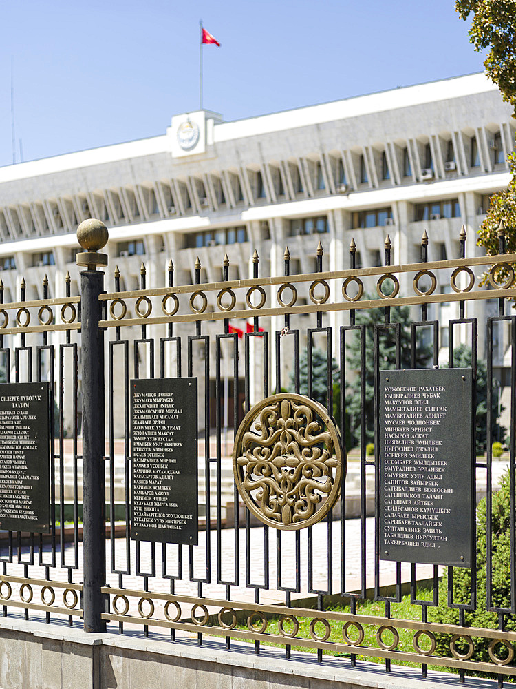 The fence with plaques of the victims of the revolution in 2010. The White House, governmental building and seat of the president. The capital Bishkek located in the foothills of Tien Shan. Asia, Central asia, Kyrgyzstan