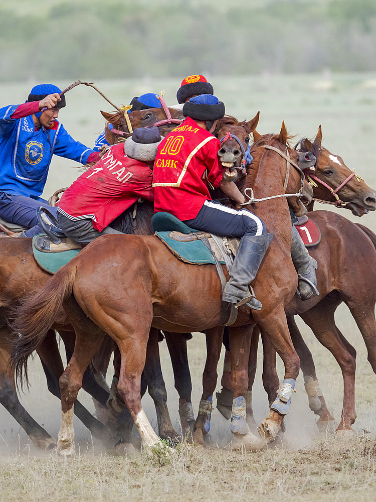 Kok Boru (Buzkashi), traditional equestrian team sport. Festival on the Suusamyr plain commemorating Mr Koshkomul, a sportsman and folk hero of the last century. Kok Boru is listed as UNESCO Intangible Cultural Heritage Asia, central asia, Kyrgyzstan