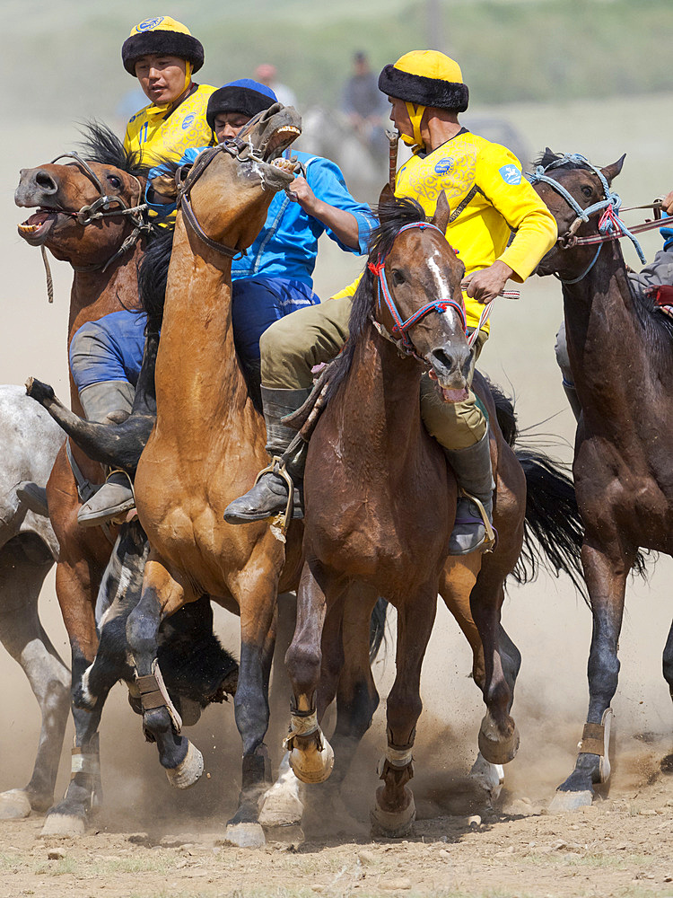 Kok Boru (Buzkashi), traditional equestrian team sport. Festival on the Suusamyr plain commemorating Mr Koshkomul, a sportsman and folk hero of the last century. Kok Boru is listed as UNESCO Intangible Cultural Heritage Asia, central asia, Kyrgyzstan