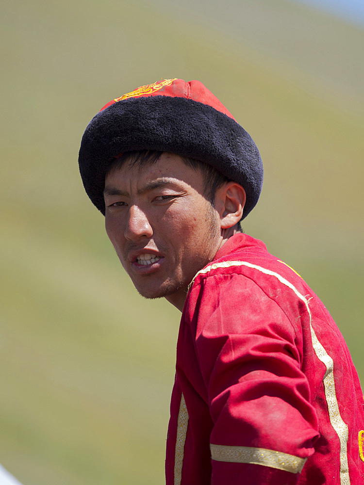 Players waiting for the next match. Kok Boru (Buzkashi), traditional equestrian team sport. Festival on the Suusamyr plain commemorating Mr Koshkomul, a sportsman and folk hero of the last century. Kok Boru is listed as UNESCO Intangible Cultural Heritage Asia, central asia, Kyrgyzstan