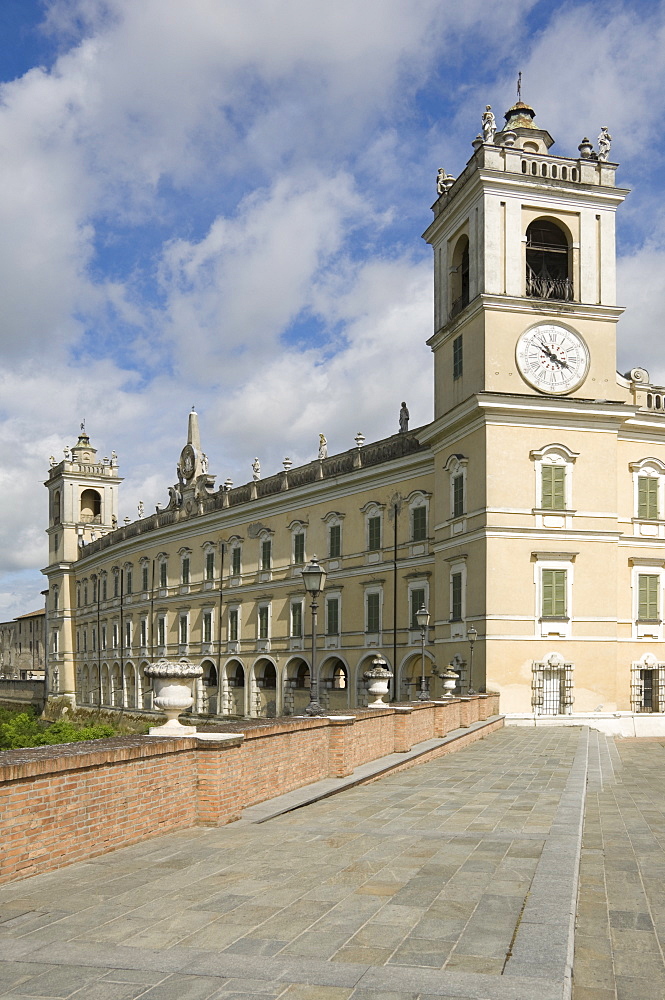 The clock tower and the long wall showing the serpentine design, The Ducal Palace (Palazzo Ducale) (Reggia di Colorno), Colorno, Emilia-Romagna, Italy