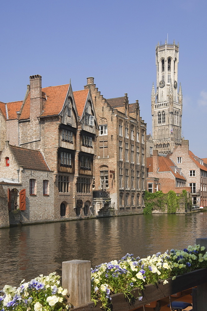 View over a canal of traditional Flemish gables and the Belfry, Brugge, UNESCO World Heritage Site, Belgium, Europe