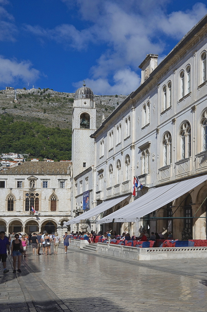 Street with cafes, foot worn polished pavement and the Clock Tower, Old City, Dubrovnik, UNESCO World Heritage Site, Croatia, Europe