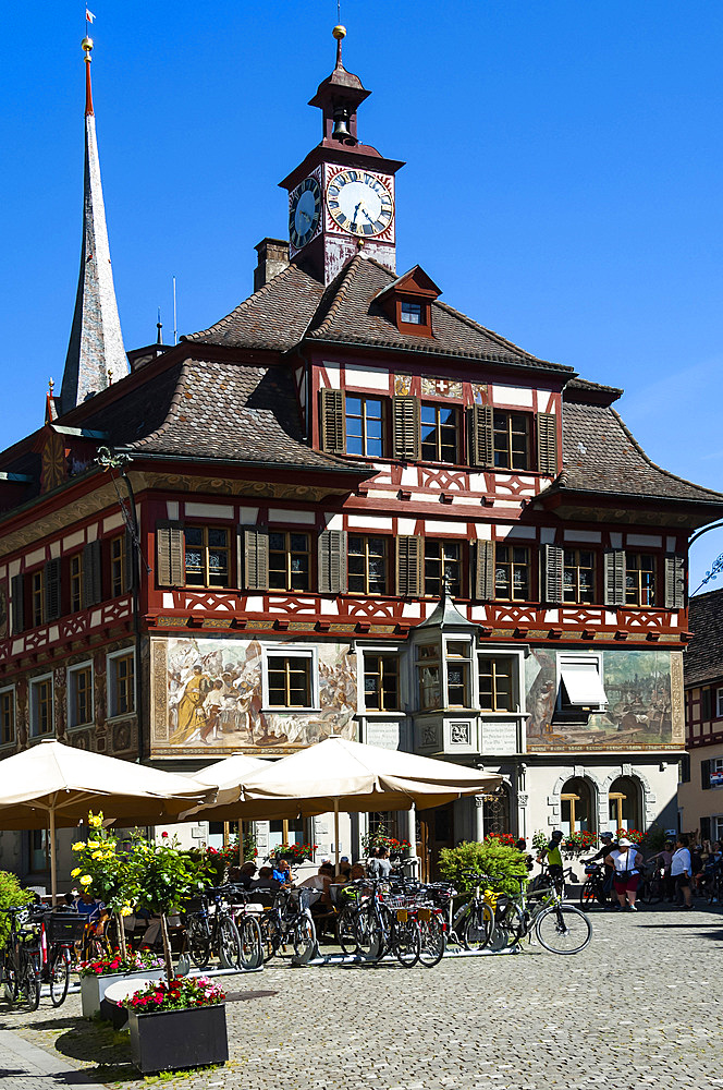 Rathaus (Townhall), cyclists, Stein am Rhein, Canton of Schaffhausen, Switzerland, Europe