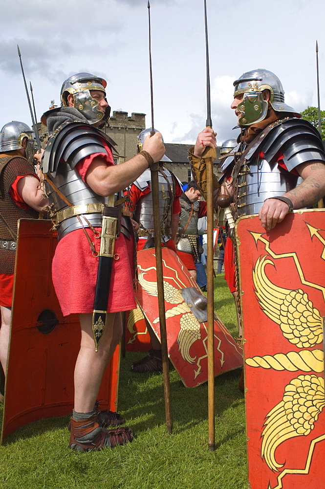 Two members of the Ermine Street Guard in conversation, Birdoswald Roman Fort, Hadrians Wall, Northumbria, England, United Kingdom, Euruope