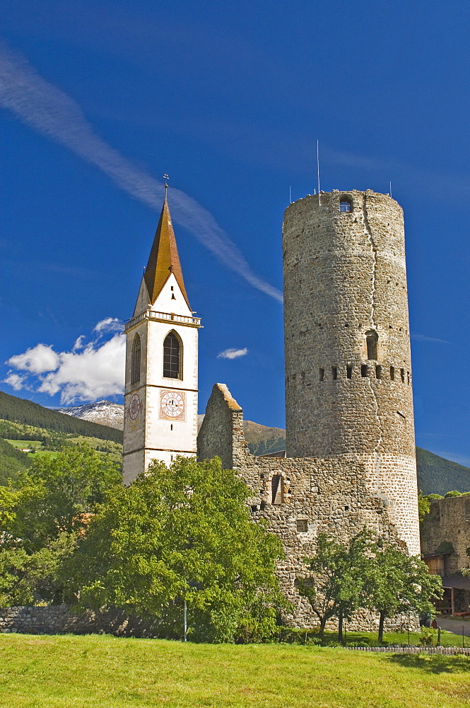 The church and tower of ancient castle, Malles Venosta, below Reschen Pass, Western Dolomites, Italy, Europe