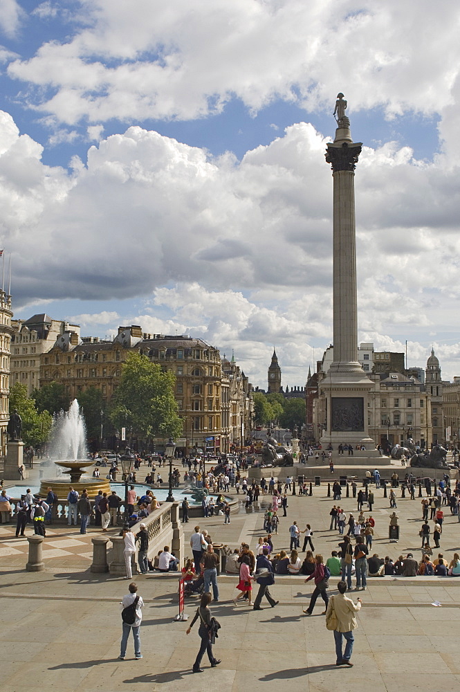 Nelsons Column in Trafalgar Square, with Big Ben in distance, London, England, United Kingdom, Europe