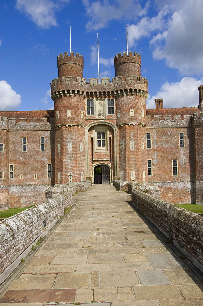 Causeway to main entrance of the 15th century Herstmonceux Castle, East Sussex, England, United Kingdom, Europe