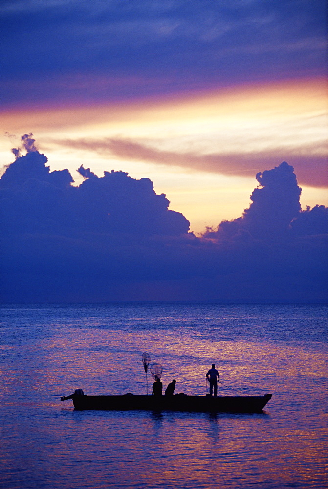 Fishing boat in the Indian Ocean at dawn, island of Zanzibar, Tanzania, East Africa, Africa