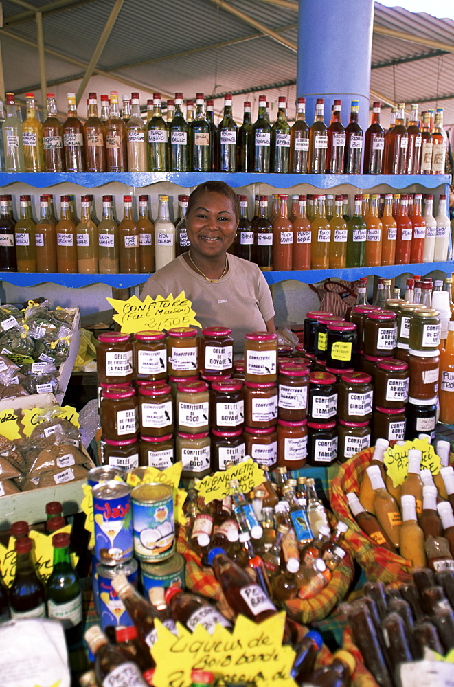 Woman selling locally produced food at the market in Sainte Anne, Martinique, Lesser Antilles, West Indies, Caribbean, Central America