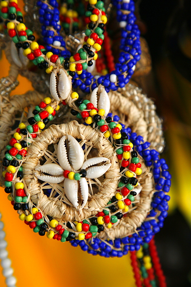 Candomble wear strings of beads made of seeds and shells in the colours of African gods. Cachoeira, Bahia, Brazil.