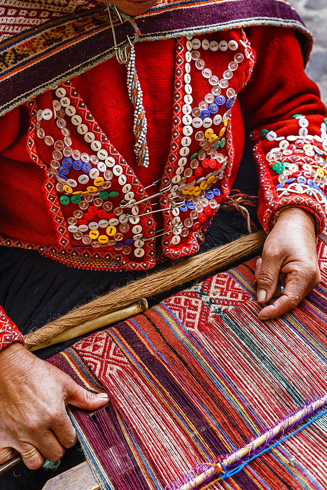 Quechua woman weaving a traditional textile, Cuzco, Peru, South America 