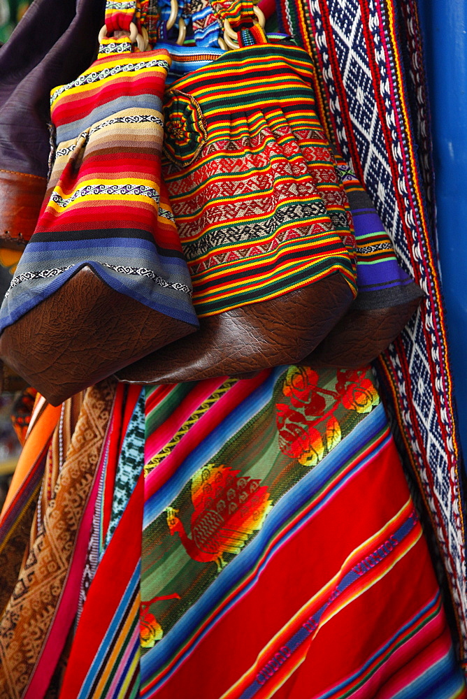 Local carpets made of llama and alpaca wool for sale at the market, Cuzco, Peru, South America 