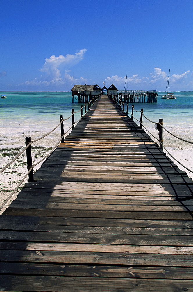 Bridge leading to a bar on the water, Kiwengwa beach, Zanzibar, Tanzania, East Africa, Africa