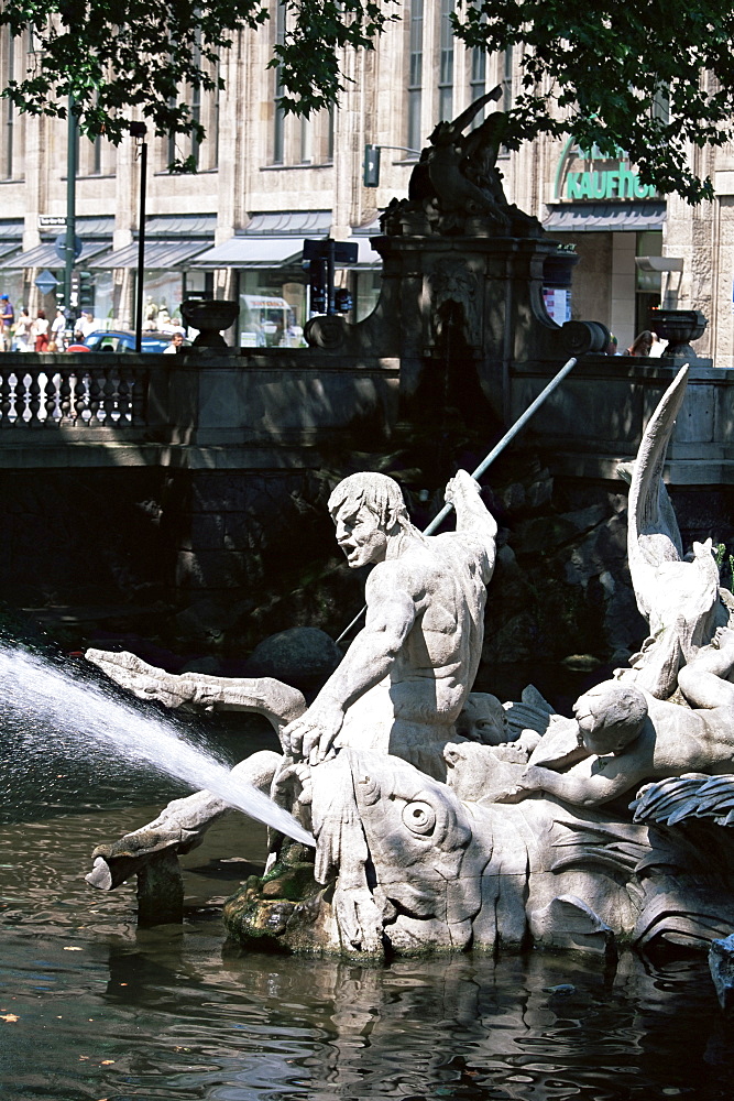 Triton fountain in Konigsallee, Dusseldorf, North Rhine Westphalia, Germany, Europe