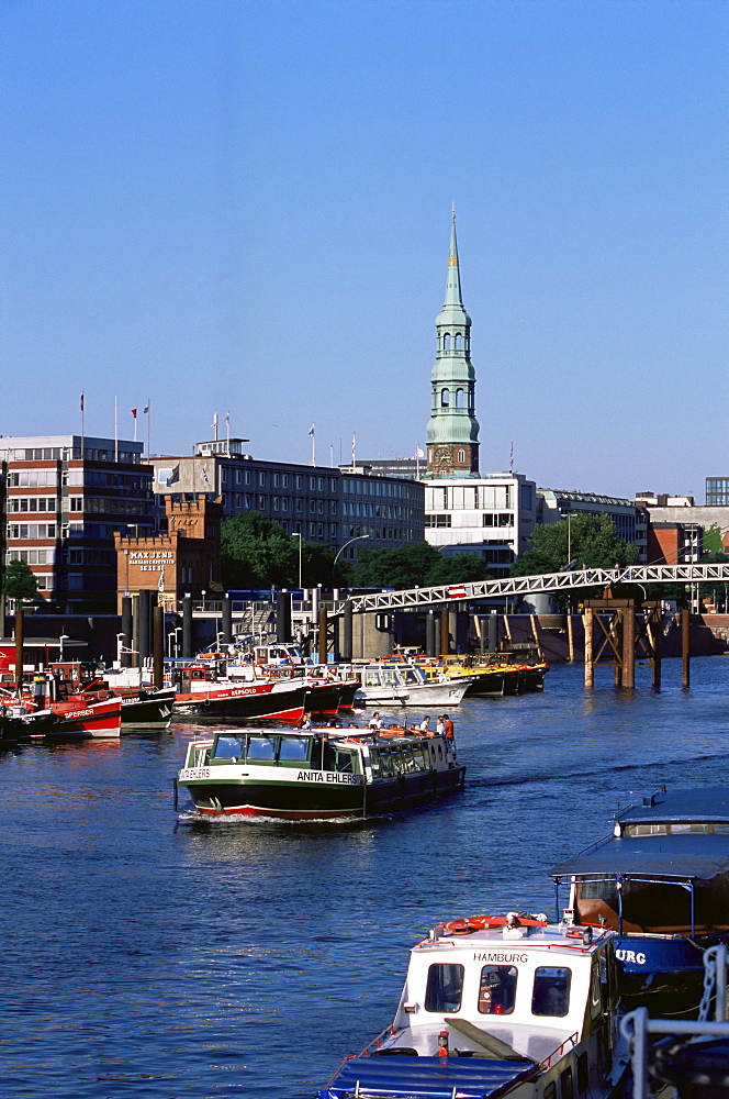 Boat on canal in the Speicherstadt, the historical warehouse city area, Hamburg, Germany, Europe