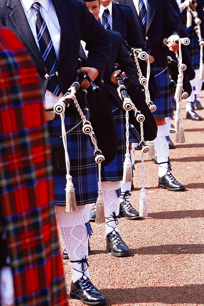 Bagpipe players with traditional Scottish uniform, Glasgow, Scotland, United Kingdom, Europe