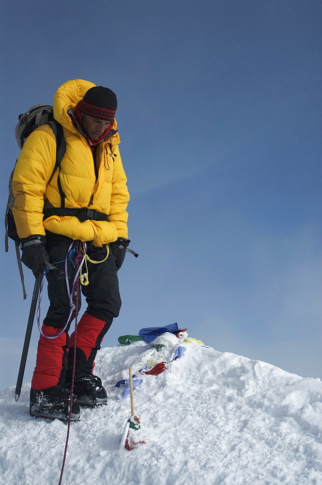 Man on summit of Mount Denali, 20320 ft, Alaska, United States of America, North America