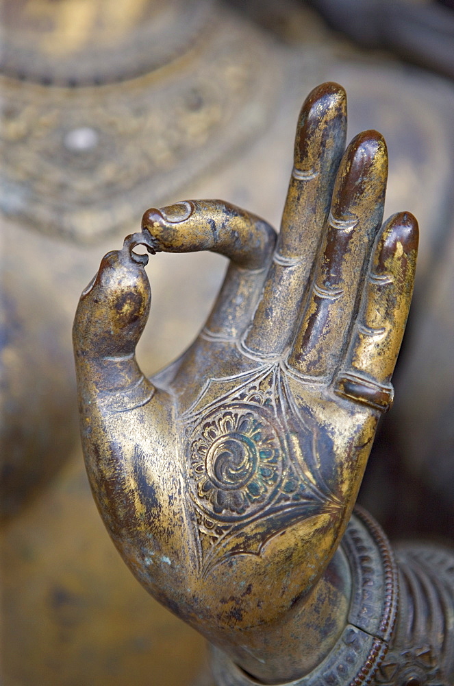 Close-up of the hand of Ganga, a river goddess statue in Mul Cowk courtyard, Durbar Square, Patan, Kathmandu Valley, Nepal, Asia