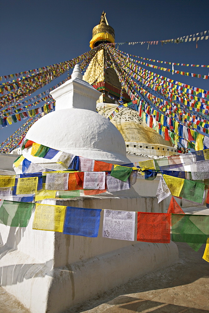 Buddhist stupa known as Boudha at Bodhanath, Kathmandu, Nepal. Taken at Lhosar, the Tibetan new year, hence the abundance of new prayer flags.