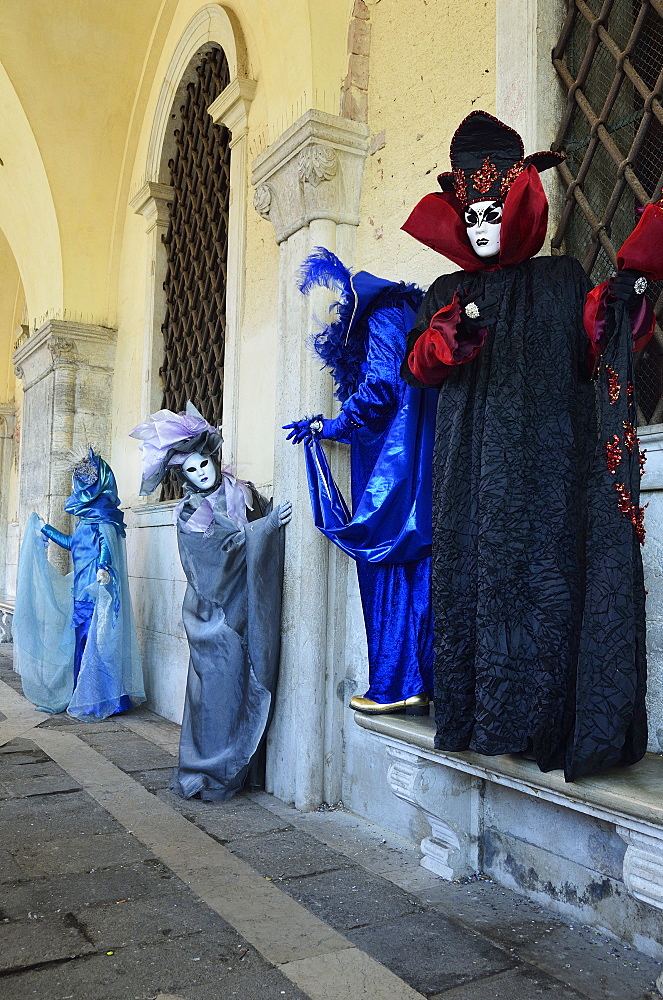 Masked figures in costume at the 2012 Carnival, Venice, Veneto, Italy, Europe