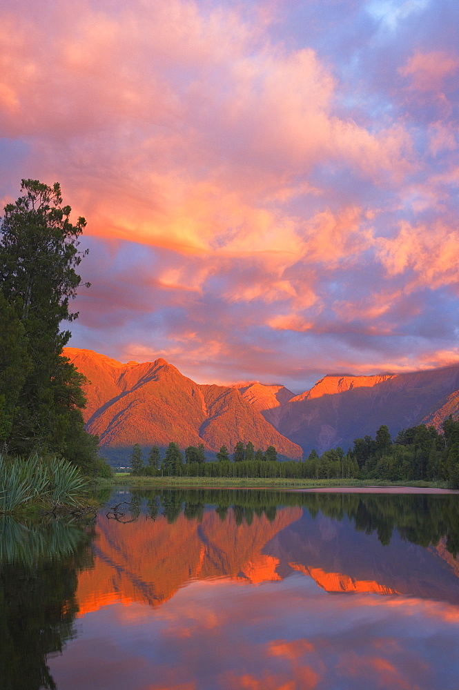 Sunset, Lake Matheson and Southern Alps, Westland, South Island, New Zealand, Pacific