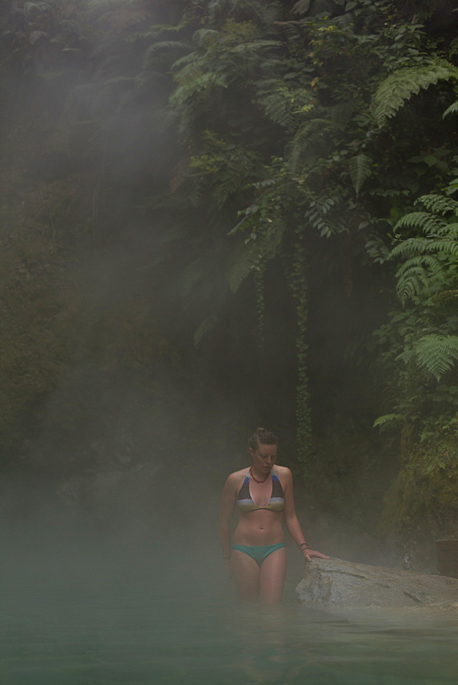 Woman in hot springs, Las Fuentes Gorginas, Zunil, Quetzaltenango, Guatemala, Central America