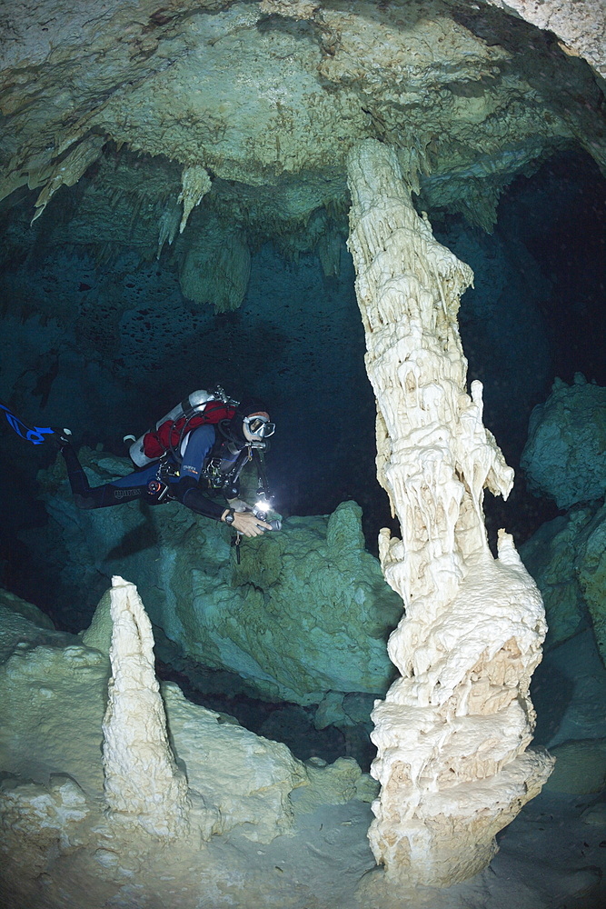 Scuba diver in Bat Cave Cenote, Playa del Carmen, Yucatan Peninsula, Mexico