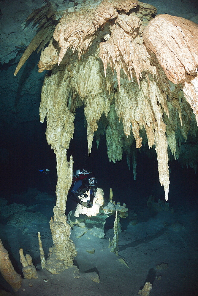 Scuba diver in Bat Cave Cenote, Playa del Carmen, Yucatan Peninsula, Mexico