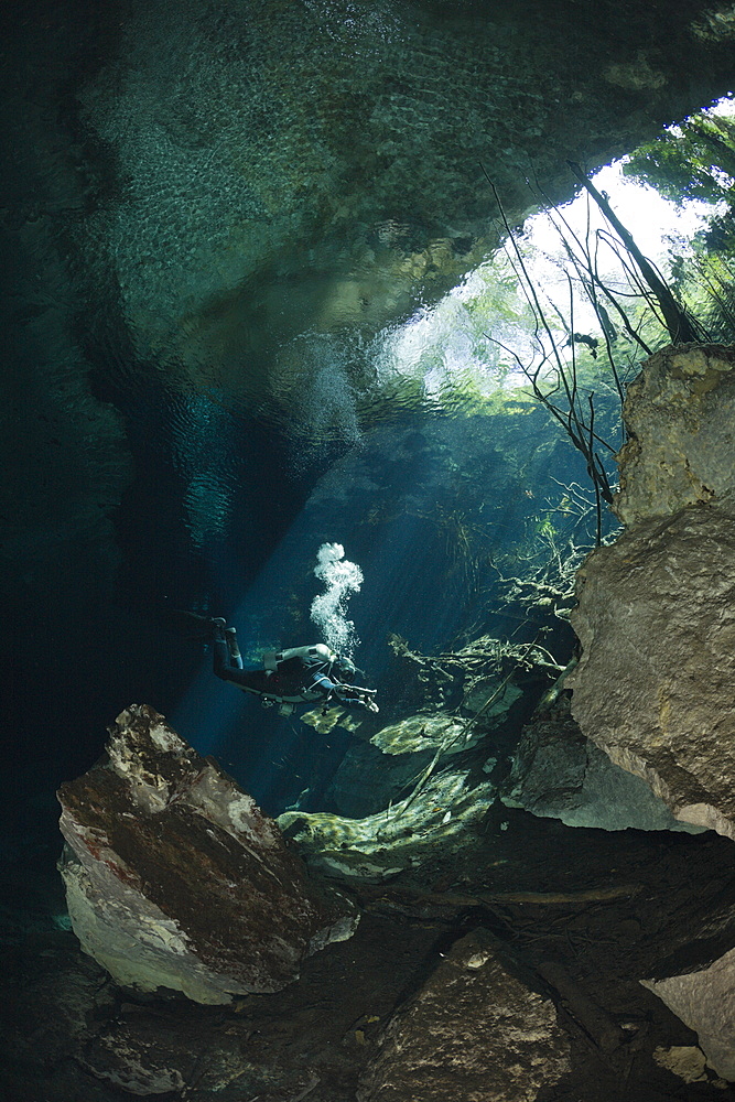 Cave Diver in Chac Mool Cenote, Playa del Carmen, Yucatan Peninsula, Mexico