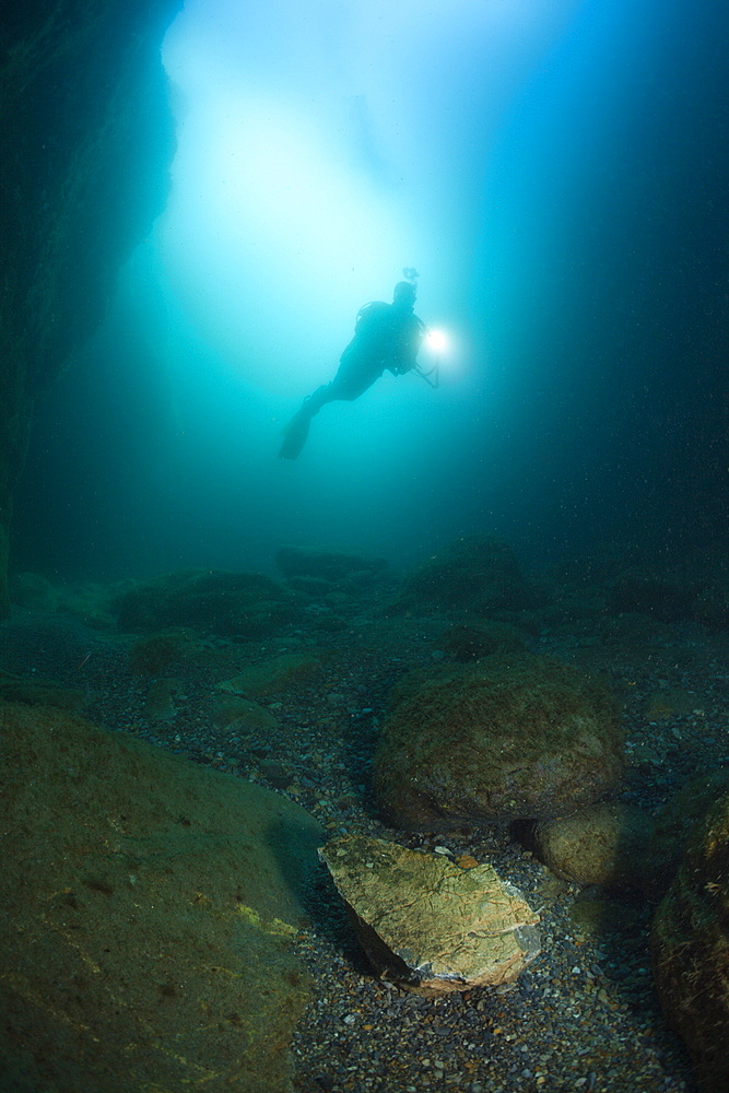 Scuba diver inside cave, Cap de Creus, Costa Brava, Spain, Mediterranean, Europe