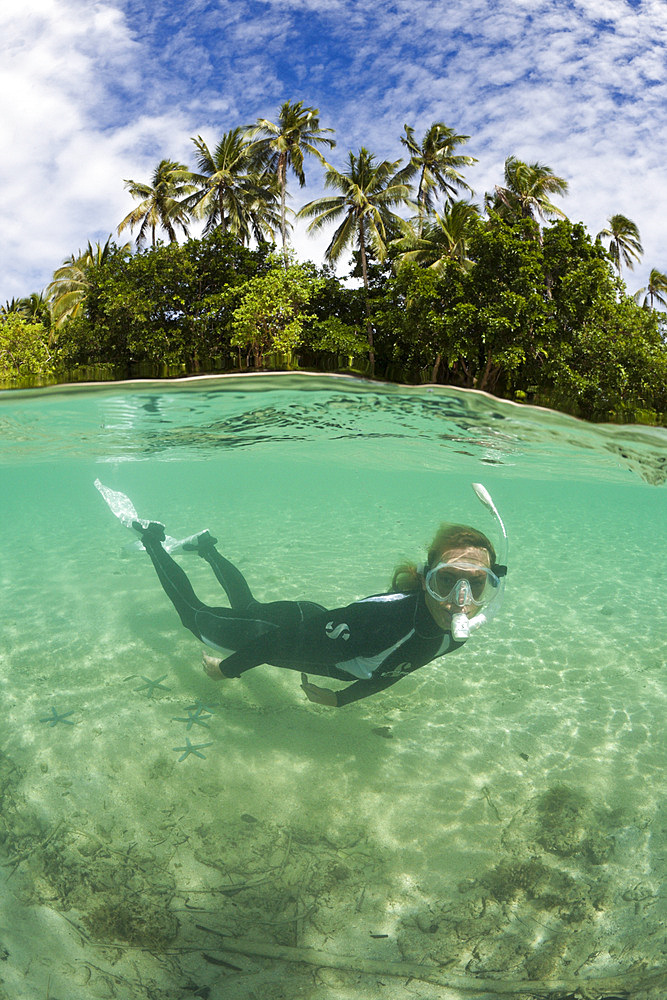 Snorkeling in Lagoon of Ahe Island, Cenderawasih Bay, West Papua, Indonesia, Southeast Asia, Asia