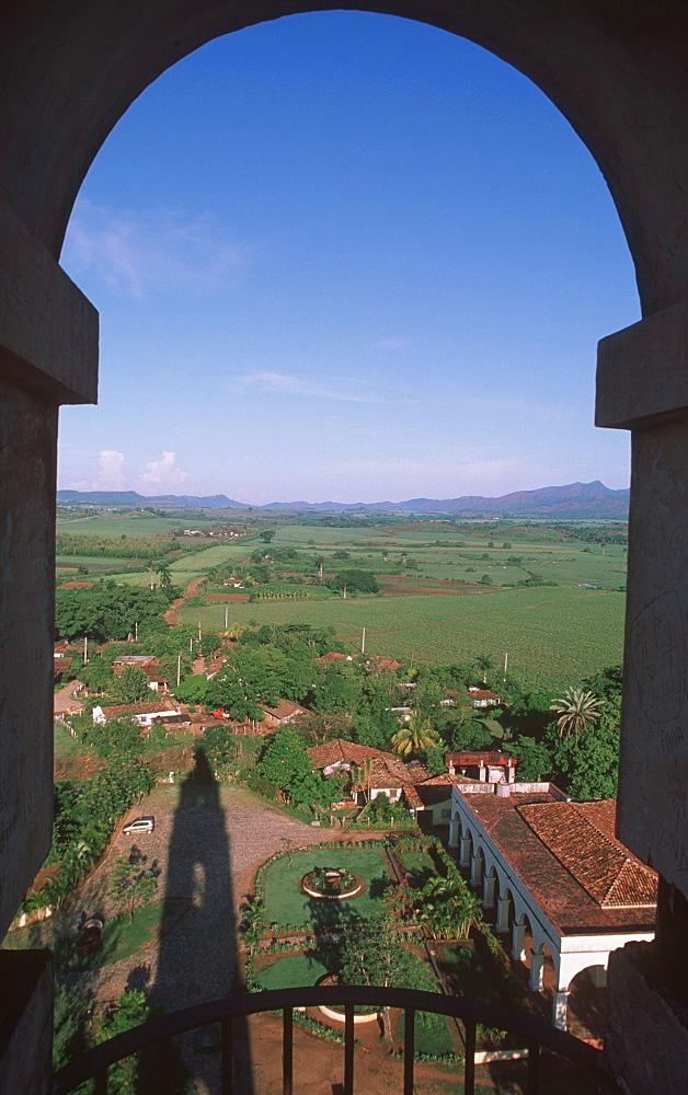 Rooftops of town and landscape of Valle de los Ingenios (Valley of Sugarcane Mills) from the Torre de Iznaga, Trinidad, Sancti Spiritus Province, Cuba