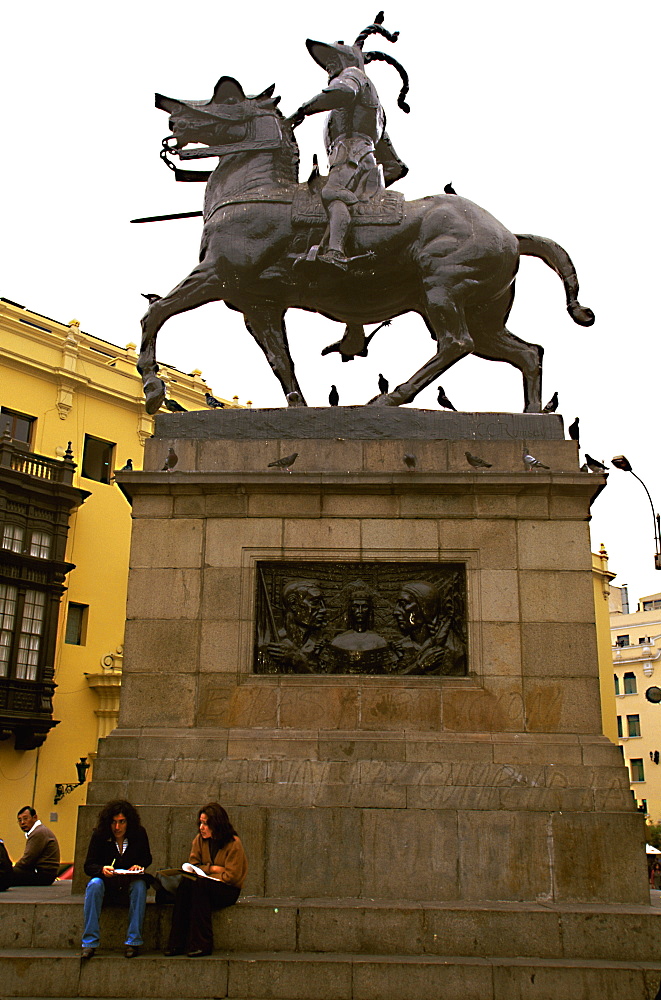 The statue of Francisco Pizarro, the Spanish conqueror of the Incas, facing toward the Cathedral just off the Plaza de Armas, Colonial Architecture, Lima, Peru