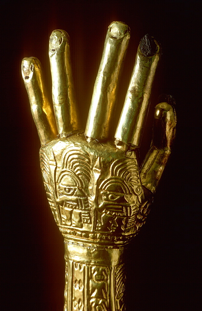 Precolumbian Gold Chimu Culture 1000-1400AD Gold Arms with embossed warrior figures, used in funerary rites collection of Museo del Oro, Lima, Peru