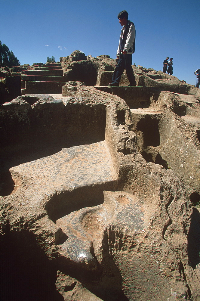 Qenko Qengo, an Inca shrine with a circular amphitheater and 18' carved stone dedicated to the worship of mother earth (Pacha Mama), Highlands, Peru