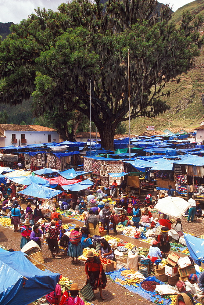 Pisac Village in the Valley of the Incas Sunday Market, one of the world's most colorful craft and produce markets, Cuzco area, Highlands, Peru