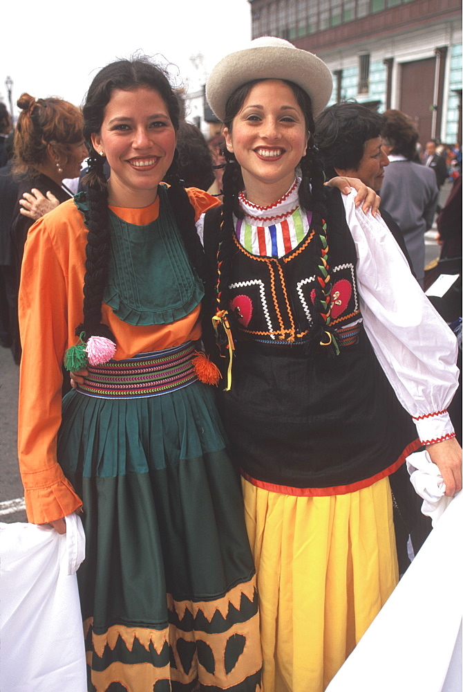 A colonial city on Peru's north coast the Tribute to the Flag Parade on Plaza de Armas young women in dress typical of Trujillo, Trujillo, Peru