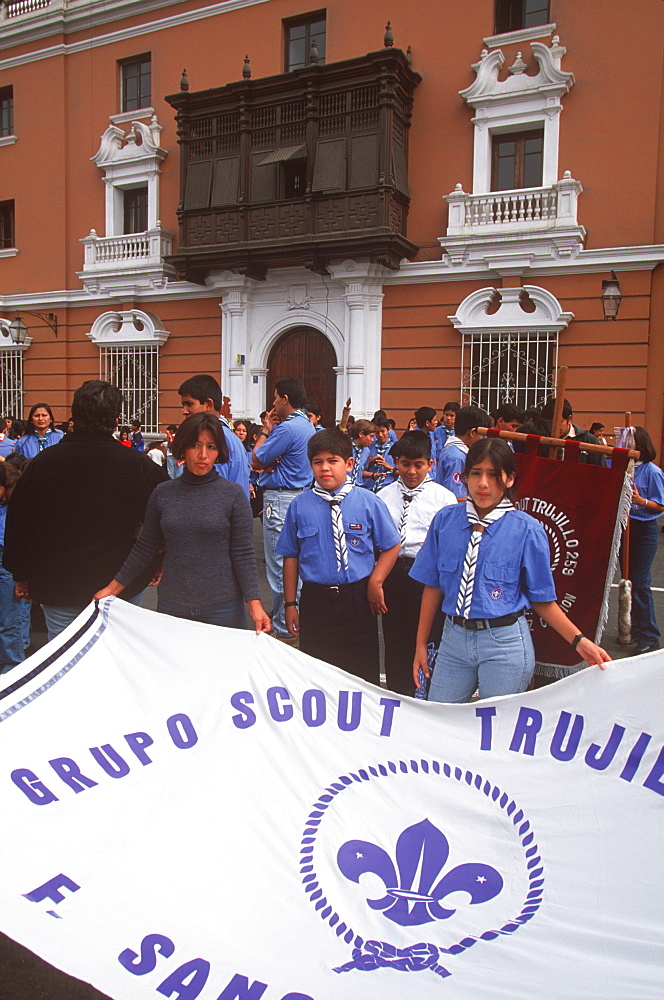 A colonial city on Peru's north coast the Tribute to the Flag Parade on Plaza de Armas boy and girl scout groups, Trujillo, Peru