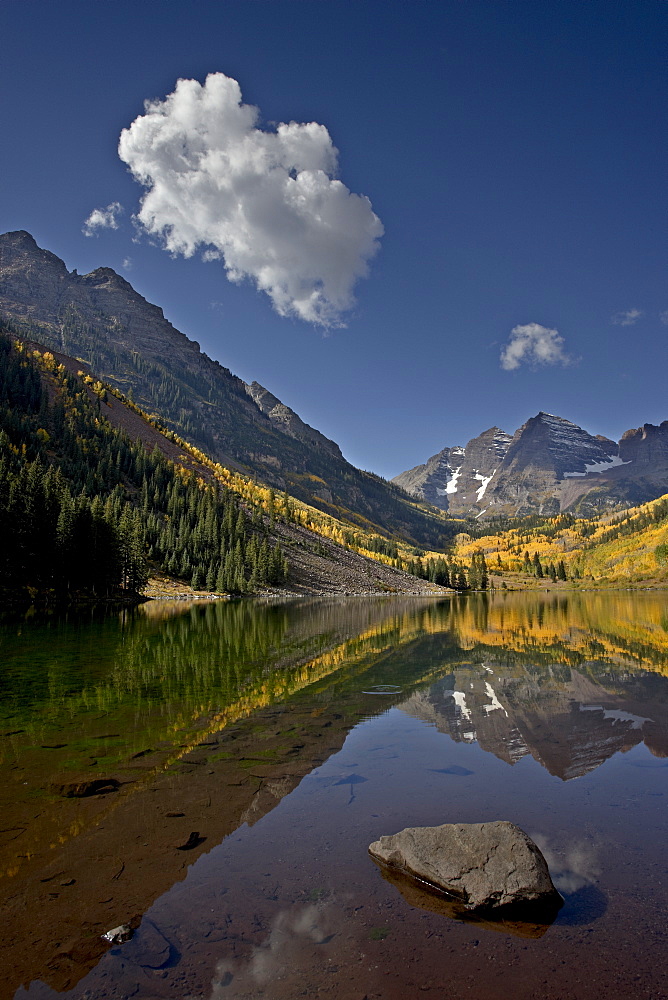 Maroon Bells reflected in Maroon Lake with fall color, White River National Forest, Colorado, United States of America, North America