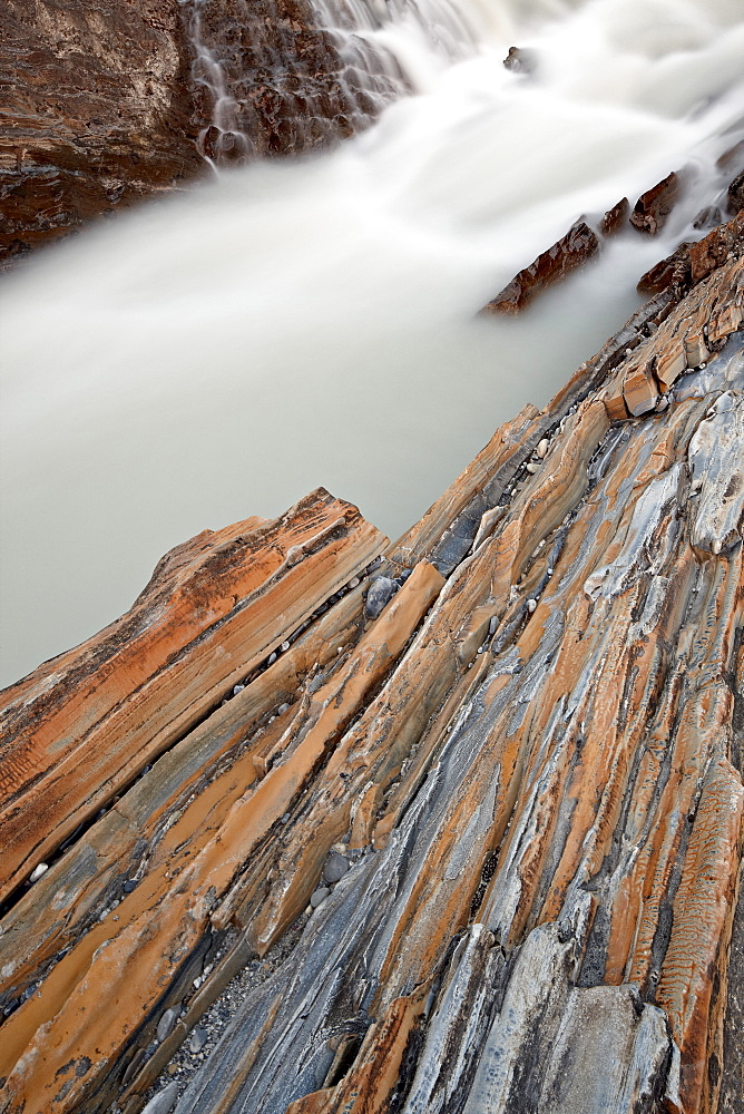 Cascade on the Kicking Horse River with orange rocks, Yoho National Park, UNESCO World Heritage Site, British Columbia, Canada, North America