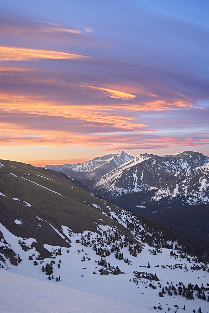 Orange clouds at dawn above Longs Peak, Rocky Mountain National Park, Colorado, United States of America, North America