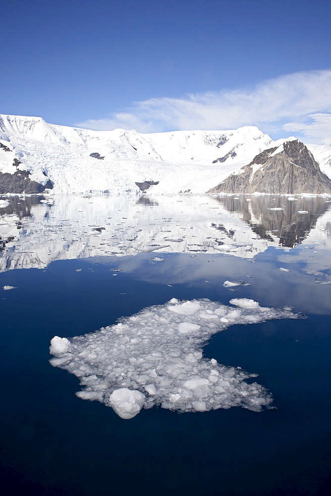 Ice in Neko Harbor with glaciers and snow-covered mountains, Antarctic Peninsula, Antarctica, Polar Regions