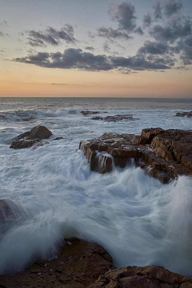 Surf along the rocky coast at sunset, Elands Bay, South Africa, Africa