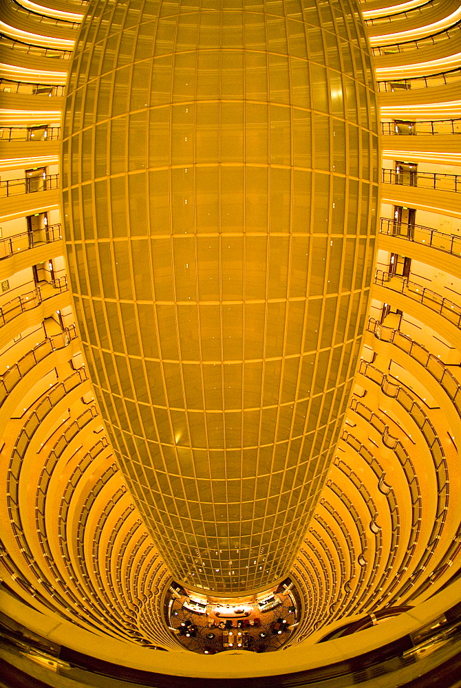 View from the Jin Mao building looking down to the 55th floor, which is the atrium of the Grand Hyatt Hotel, Shanghai, China, Asia