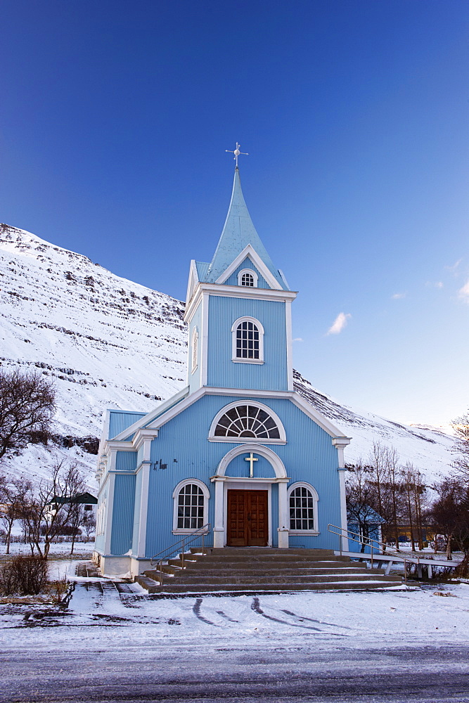 Traditional wooden church, built in 1922, at Seydisfjordur, a town founded in 1895 by a Norwegian fishing company, now main ferry port to and from Europe in the East Fjords, Iceland, Polar Regions