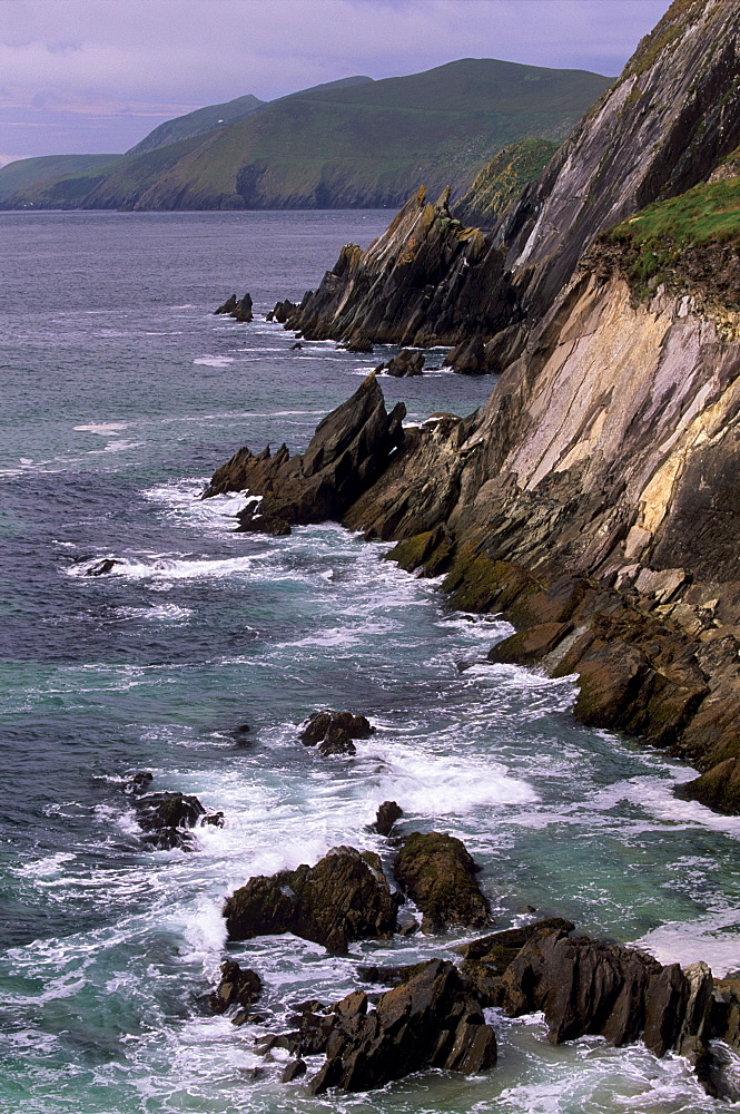 Rocky coast of Slea Head, and Blasket islands in the distance, Dingle peninsula, County Kerry, Munster, Republic of Ireland, Europe