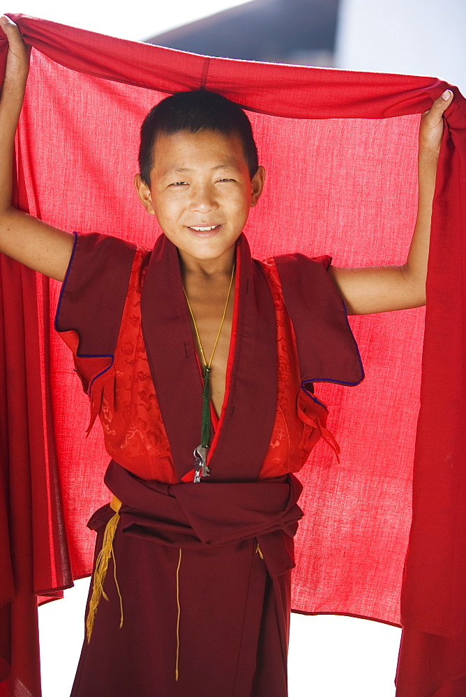 Young Buddhhist monk, Punakha Dzong, Punakha, Bhutan, Asia