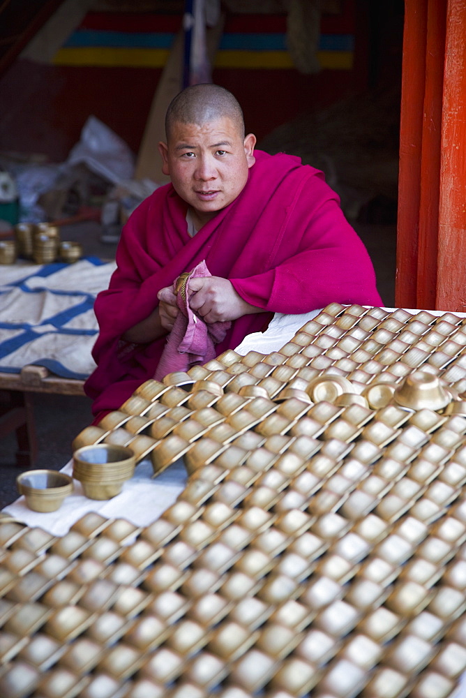 Buddhist monk in monastery, on the route between Zhongdian and Deqin, on the Tibetan border, Shangri-La region, Yunnan Province, China, Asia