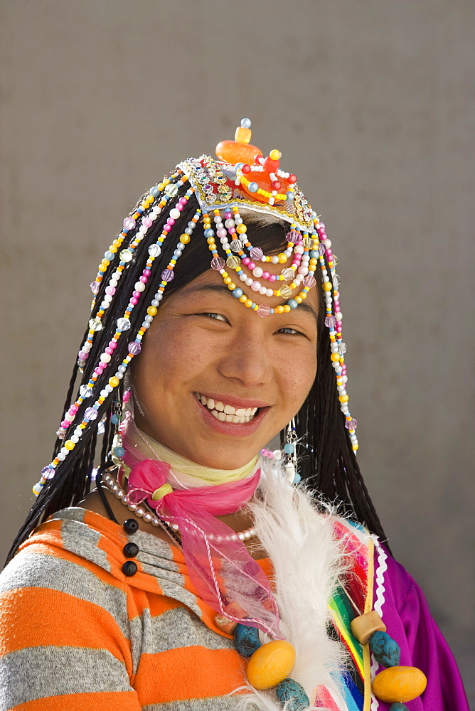 Woman of the Naxi minority people, Shangri-La, formerly Zhongdian, Shangri-La region, Yunnan Province, China, Asia